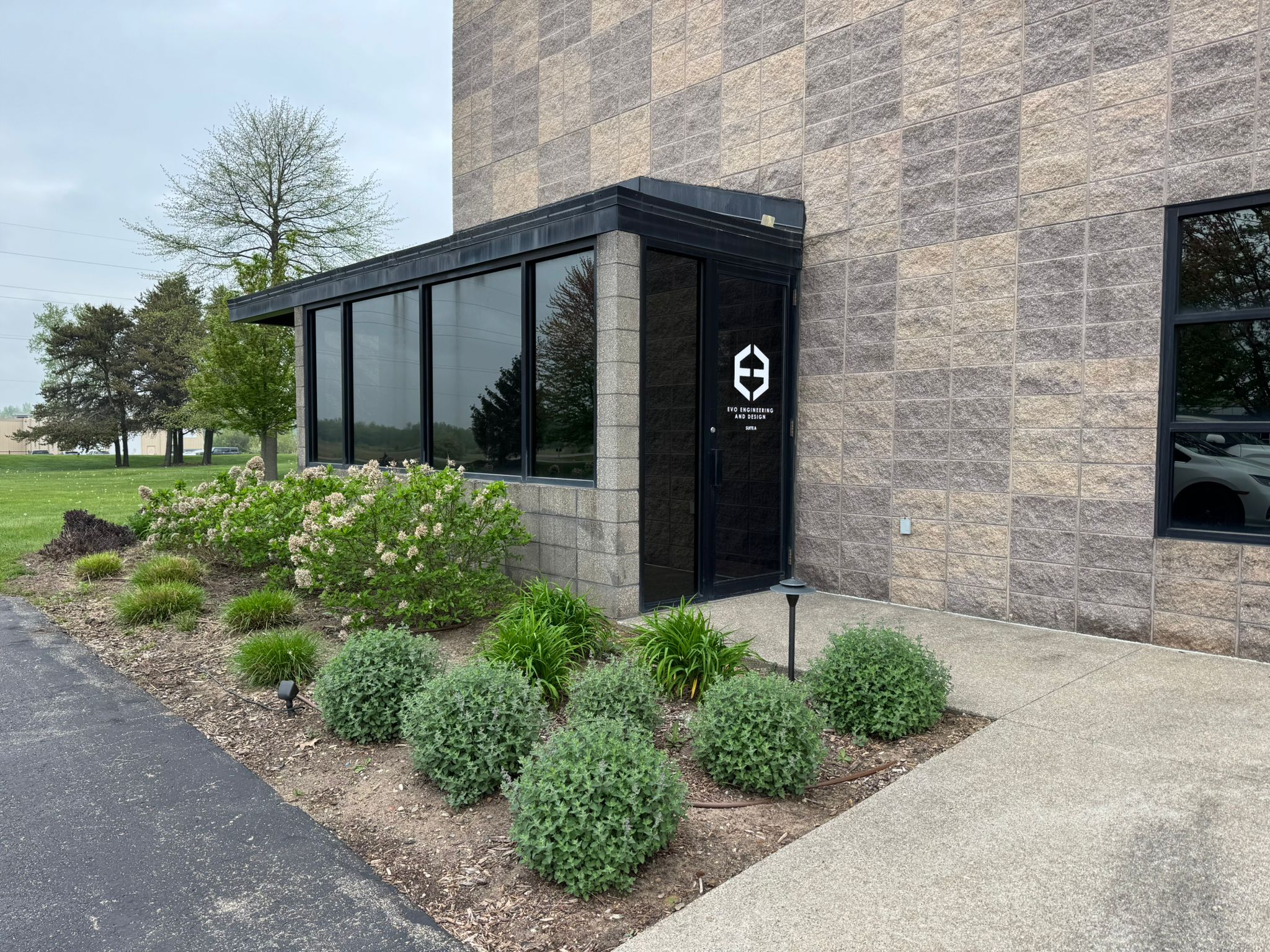 Evo Engineering and Design front entrance with the hex logo on the door, Holland, MI